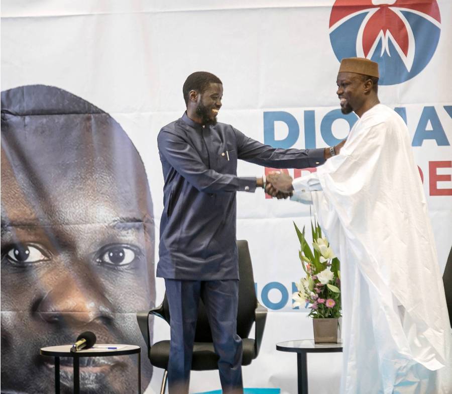 Ousmane Sonko with Bassirou Diomaye Faye at a press conference in Dakar on 15 March 2024. ANDREA FERRO/REDUX – REA