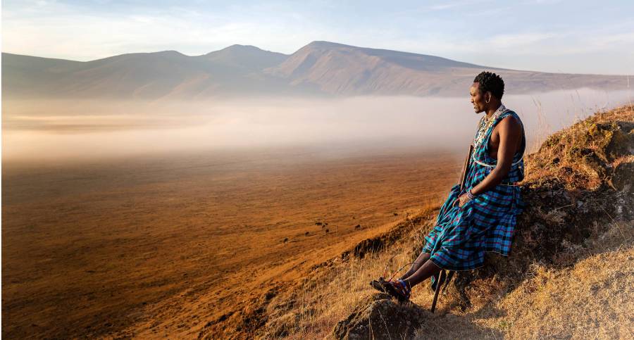 A Maasai warrior in traditional dress in the Ngorongoro Crater. SHUTTERSTOCK