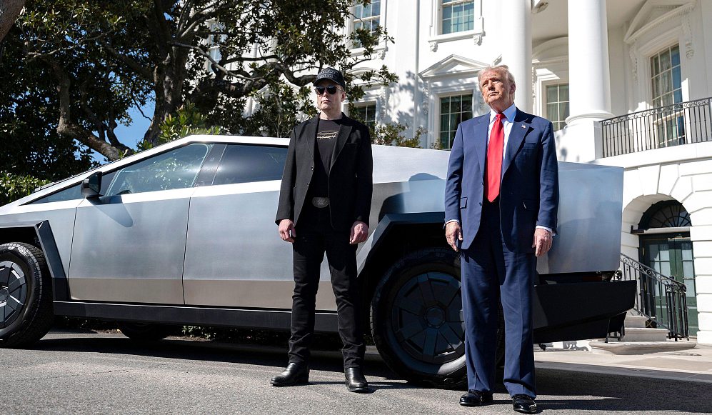 President Donald Trump and billionaire Elon Musk in the White House courtyard on 11 March 2025 in Washington. ALAMY STOCK PHOTO