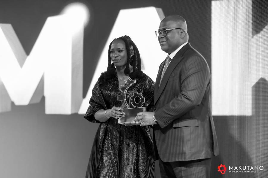 Nicole Sulu at the forum's gala dinner, alongside the President of the DRC, Félix Tshisekedi. ©