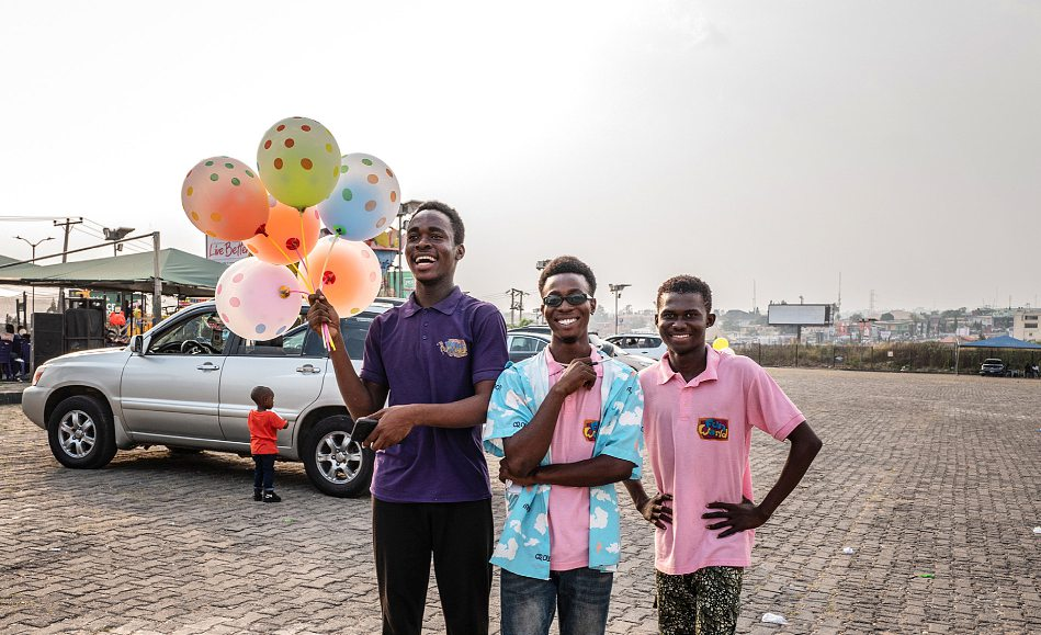 First, the young, who are very numerous, must be convinced. This is the parking lot of the Palms shopping centre in Ibadan.