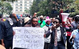 Demonstrators march in Nairobi on June 20, 2024, against the measures of the finance law. SIMON LIBZ/SHUTTERSTOCK