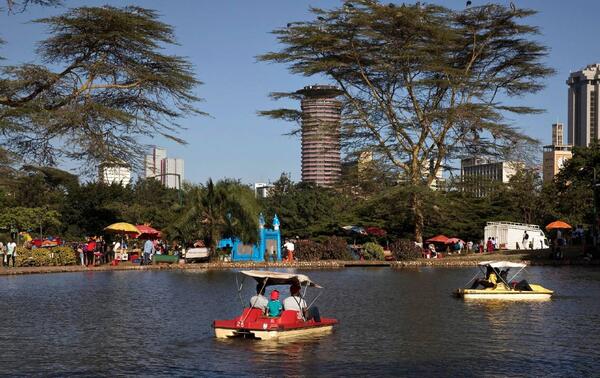 Pedal boats on an artificial lake in Uhuru Park. SIEGFRIED MODOLA/ALAMY STOCK PHOTO