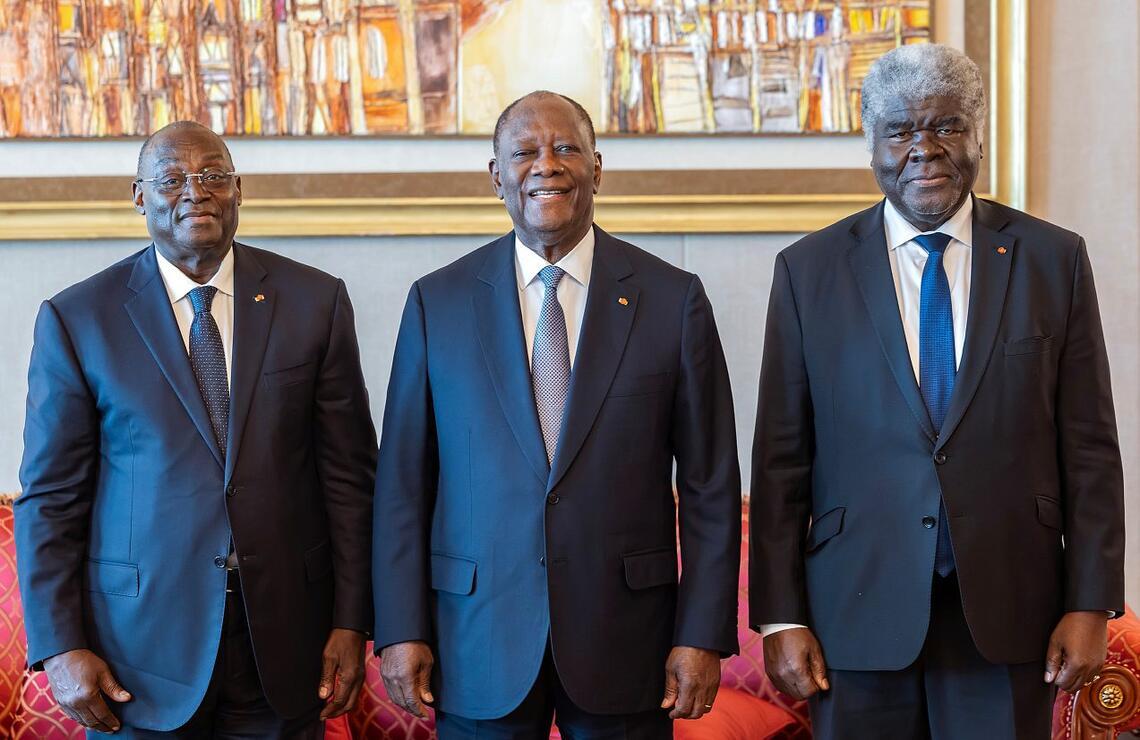 An Ivorian Promise Head of State Alassane Ouattara with Vice-President Tiémoko Meyliet Koné (left) and Prime Minister Robert Beugré Mambé (right). ANGE SERVAIS MAHOUENA