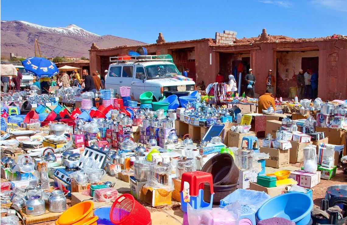 Plastic items for sale at the Telouet souk in Morocco. ALAMY