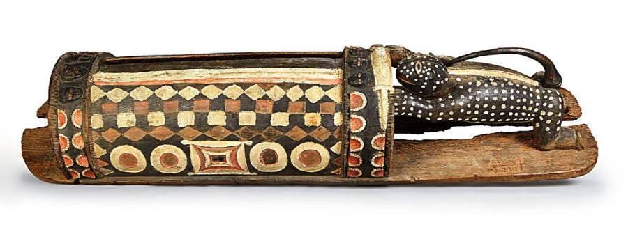 A 3.5-metre-long, 430-kilogram carved wooden slit drum, the Djidji Ayôkwé. —Quai Branly Museum